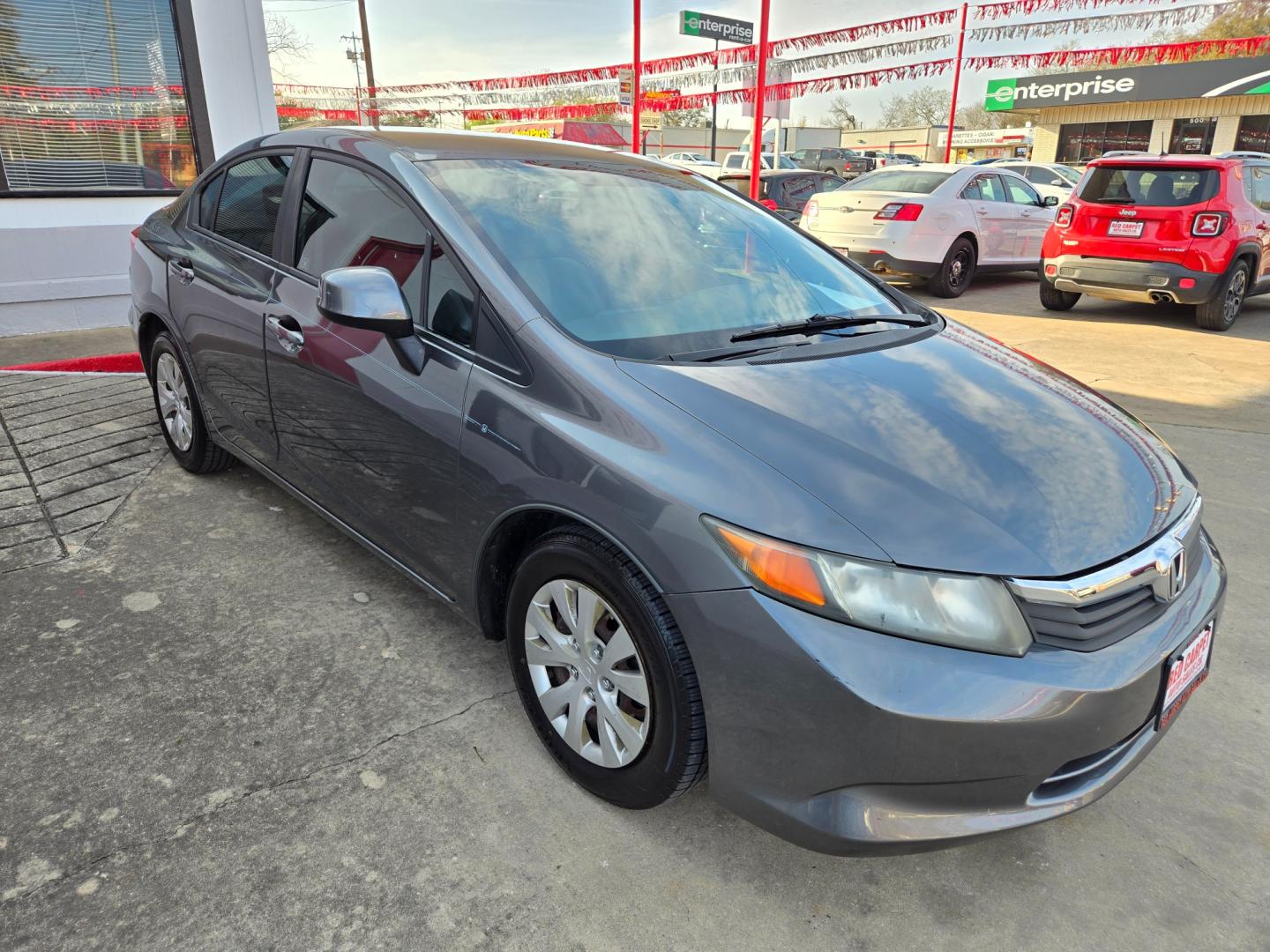 2012 GRAY Honda Civic (2HGFB2F58CH) with an 1.8L I4 F SOHC 16V engine, Automatic transmission, located at 503 West Court, Seguin, TX, 78155, (830) 379-3373, 29.568621, -97.969803 - Photo#1